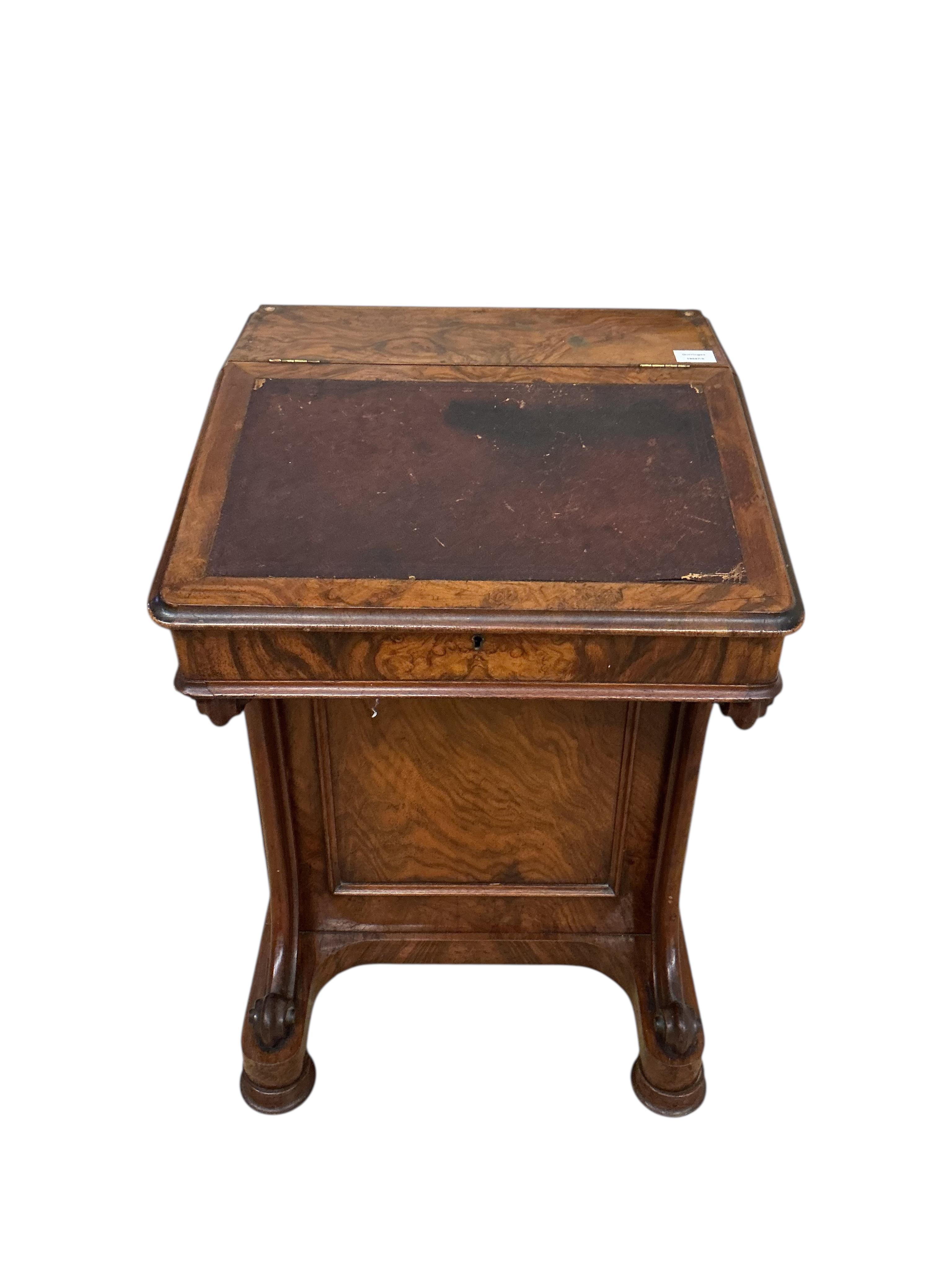 A Victorian figured walnut Davenport, lacks superstructure, width 53cm, depth 53cm, height 81cm